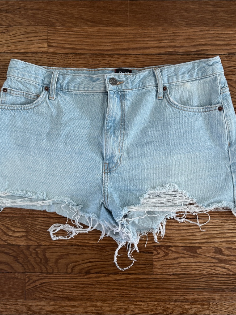 BDG High-Rise Distressed Light Blue Denim Shorts